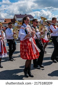 Straznice, Czech Republic - June 25, 2022 International Folklore Festival. brass music in folk costumes marches in a procession