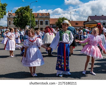 Straznice, Czech Republic - June 25, 2022 International Folklore Festival. Children in Moravian folk costume in the procession