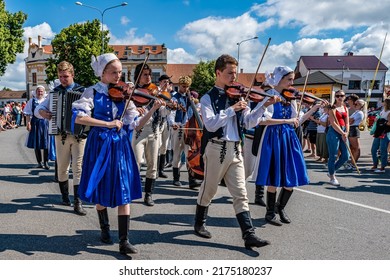 Straznice, Czech Republic - June 25, 2022 International Folklore Festival. Folk music in regional costumes in parade