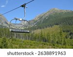 Strbske Pleso, Slovakia. The Solisko Express chairlift; Solisko Express cable car going from down to the lower station at Strbske Pleso up from the Chata pod Soliskom upper station; 