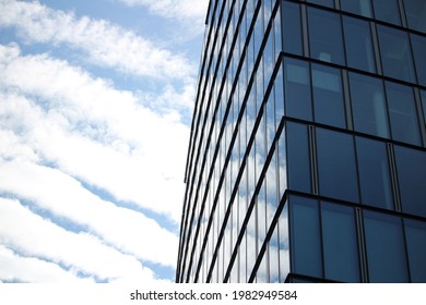 Streak clouds over a glass facade in the city of frankfurt