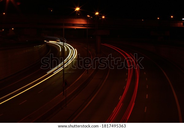 streaks of car\
lights on the street at\
night\
