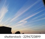 Streaks of clouds across the sky.