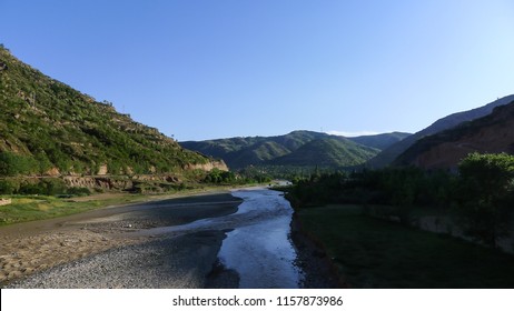 A Stream Between Mountains
