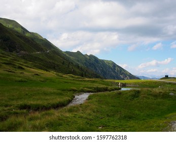 Stream flowing with mountains in the back
