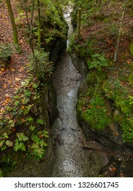 stream flows between stones