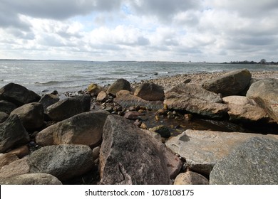 A stream flows into the ocean