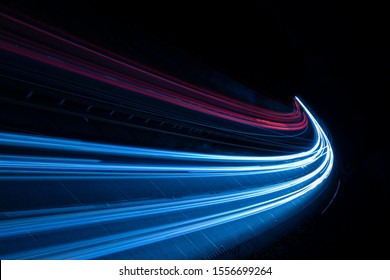 Stream Of Light Trails On Motorway At Night