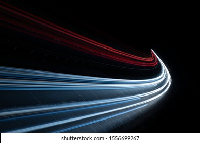 Stream Of Light Trails On Motorway At Night