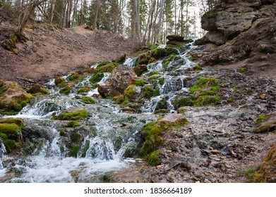 stream of water is falling down from an mountain, Latvia