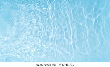 Stream of water flows from a faucet into a swimming pool. - Powered by Shutterstock