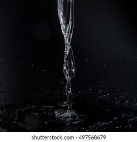 Stream Of Water On A Black Background