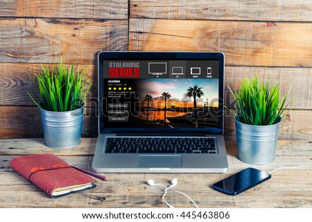 Streaming series website in a laptop computer at a workplace.
