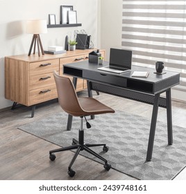 Streamlined Modern Home Office with a Perforated Black Desk, Mid-Century Inspired Tan Leather Office Chair, Matching Wooden Sideboard, Geometric Rug, and a Set of Floating Shelves Above Displaying. - Powered by Shutterstock