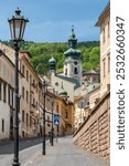 Streat view of the historic mining town Banska Stiavnica, Slovakia Popular tourist destination in Slovakia. Banska Stiavnica cityscape in summer.