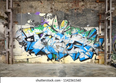 Street art. Abstract background image of a full completed graffiti painting in chrome and blue tones