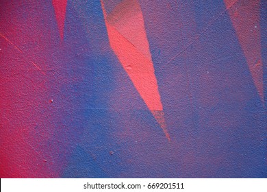 Street Art. Colorful Graffiti On The Wall. Fragment For Background. Vivid Color. Abstract Graffiti On The Wall. Pink And Blue Color