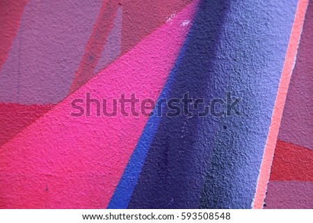 Street art. Colorful graffiti on the wall. Fragment for background. Detail of a graffiti 