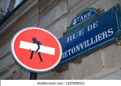 Street Art On A Traffic Sign, Paris, France, Rue De Bretonvilliers (means Bretonvilliers Street)