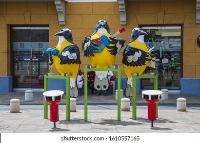 Street Art In Willemstad, Capital Of Suracao. Three Big Colorful Bird Figures. Willemstad. Curacao. 