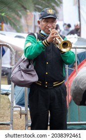 Street Artist Playing The Trumpet. Old Man Playing The Trumpet