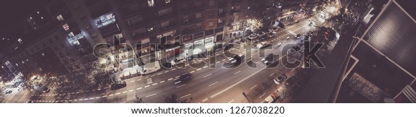 Street of\
Barcelona at night. Spain. Aerial\
view