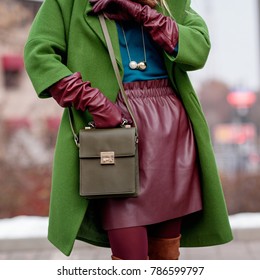 Street And Bright Style. Young Girl In A Green Coat, Stylish Leather Skirt. Details. Sguare Image Photo