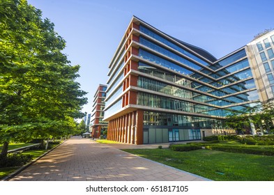 Street in Budapest with modern office buildings, beautiful reflections on glass windows - Shutterstock ID 651817105