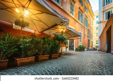 Street Cafe On A Small Street In Rome