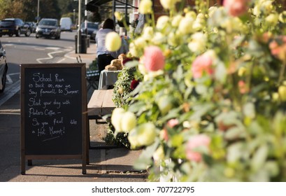 A Street Cafe With Sense Of Humor Invites All Moms To Have A Cup Of Coffee In The Morning When Children Are At School. This Is Beginning Of Autumn And School Is Run Back On. We Say Farewell To Summer