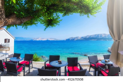 the street and city beach
a summer terrace seaside view of traditional european mediterranean restaurant - Powered by Shutterstock