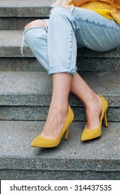 Street City Fashion Outfit With Yellow Poncho, High Heels And Boyfriend Jeans