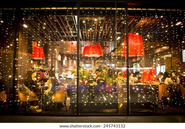 Street city night lights\
in restaurants
