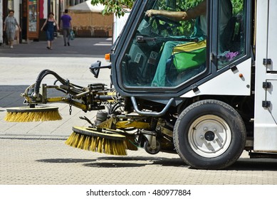 Street Cleaner Vehicle On The Road