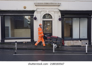 A Street Cleaner Walks Through The Town Centre On March 16, 2021 In Bradford On Avon, UK.