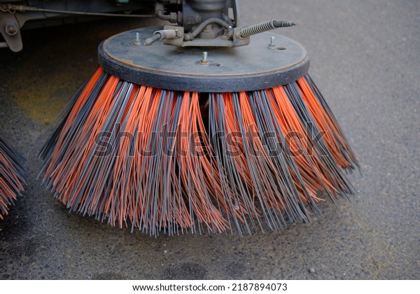 Street\
cleaning brush, in a street cleaning machine\
