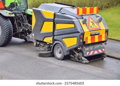 Street cleaning machine in spring.