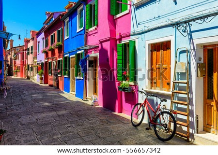 Street with colorful buildings in Burano island, Venice, Italy. Architecture and landmarks of Venice, Venice postcard