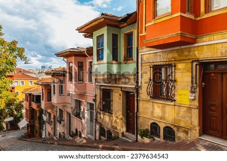 Street of colorful houses in the historical district of Fatih Balat, Istanbul. Narrow old city streets.