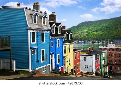 Street with colorful houses near ocean in St. John's, Newfoundland, Canada