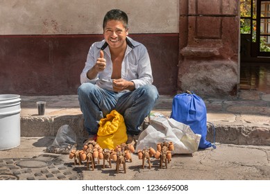 Street Craft Vendor In Mexico
This Craftsman Creates Small Wooden Mules As Decoration Purposes