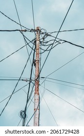 Street Electric Pole With Many Electrical Wires And Fiber Optic Cables