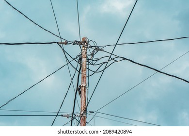 Street Electric Pole With Many Electrical Wires And Fiber Optic Cables