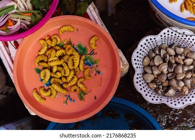 Street Exotic Food In Vietnamese Market. Maggots. Vietnam