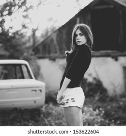 Street Fashion Portrait Of A Young Brunette Woman