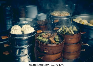 Street Food Booth Selling Asian Specialty Steamed Dumplings And Rice . . 