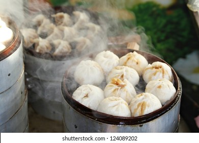 Street Food Booth Selling Chinese Specialty Steamed Dumplings In Beijing, China