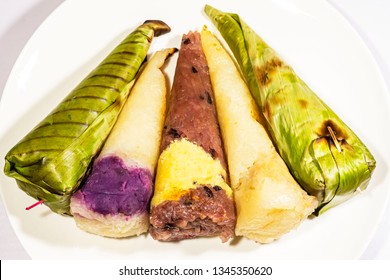 Street Food : Thailand dessert, sticky rice toast with Purple Sweet Potato on white plate. - Shutterstock ID 1345350620