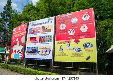 Street Giant Banner From Indonesian Covid-19 Pandemic Task Force Committee To Remind And Urge The Public To Stick To The Health Protocol. Yogyakarta, Central Java, Indonesia - May 1st, 2020.