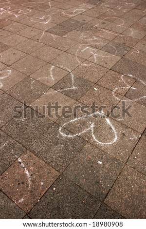 Pink arrows on the sidewalk